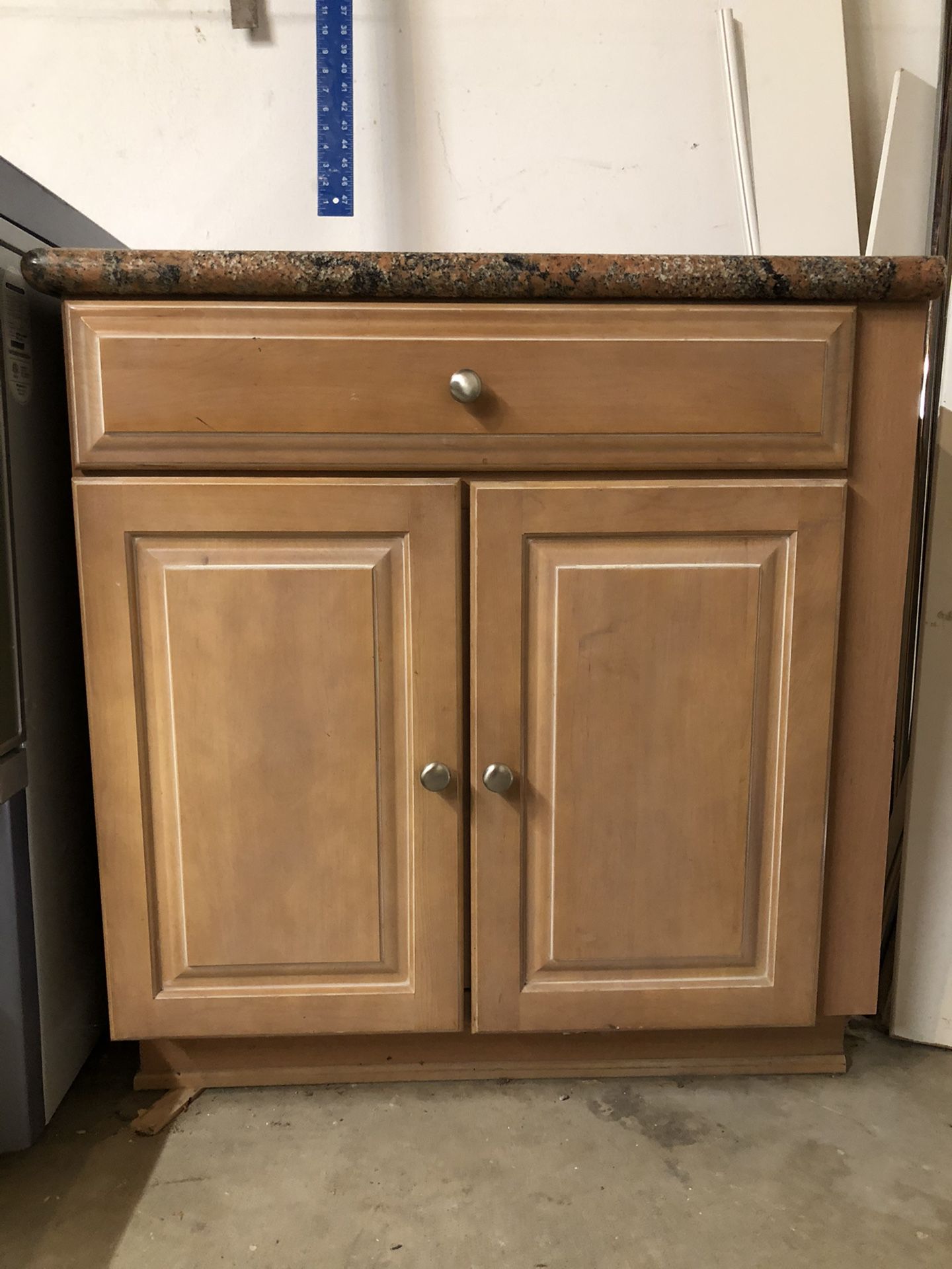 Kitchen cabinet with granite countertop