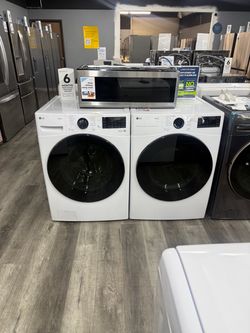 LG 4.5 Cu Ft Stackable Front Load Washer With Steam & 7.4 Cu Ft Stackable Electric Dryer Laundry Set - White 🔌