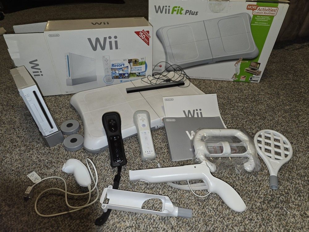 Wii Console. Wii Fit Plus. Games