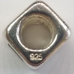 Sterling Silver Charm.