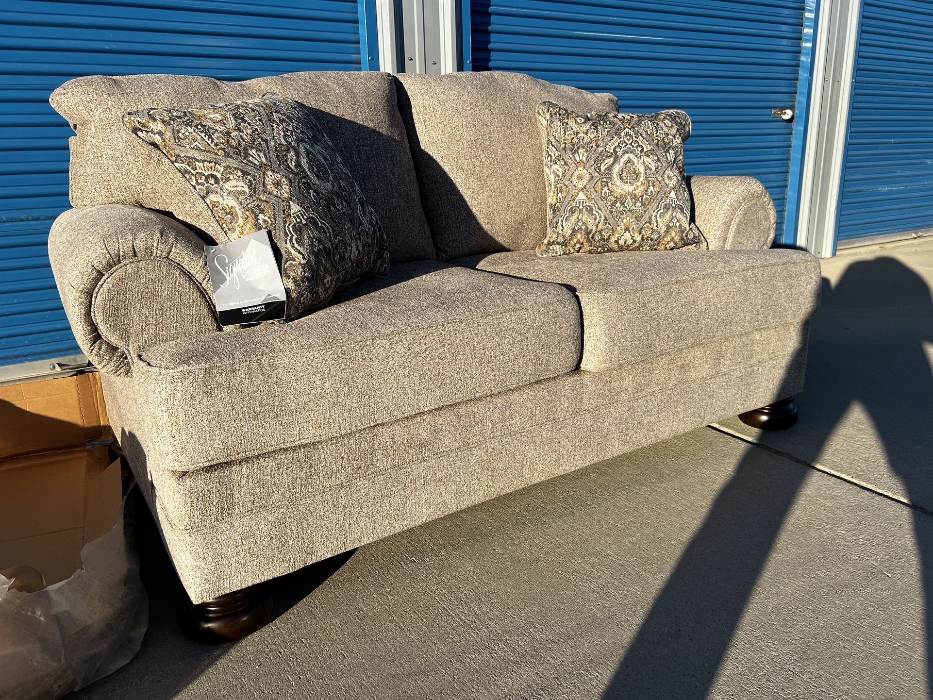 Brand New. Ashley Furniture Love Seat. Only 1 available. $399.  