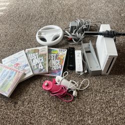 Wii + Remotes + Nunchucks + Games 