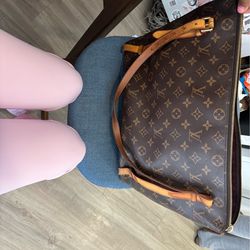Louis Vuitton Monogram Tuileries bag.