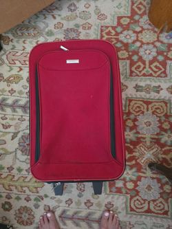 Suitcase. Red. Very good shape.
