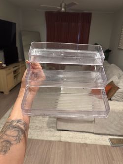stacked perfume tray