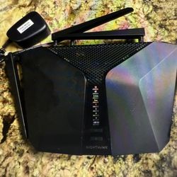 Netgear RAX50-100NAR Nighthawk 6-stream AX5400 WiFi Router 