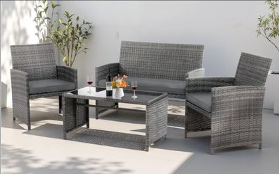 4-Piece Wicker Outdoor Sofa Conversation Set with Cushions and Table