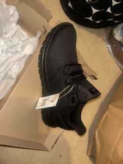 New men’s Adidas sneakers size 12
