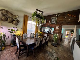 Dark Wood Dining Table with 8 Upholstered Chairs