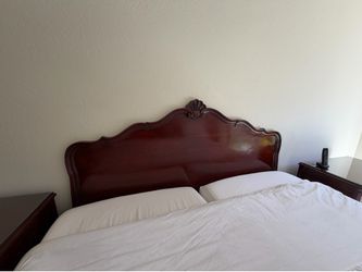 Beautiful luxury bedroom set in a rich cherry finish with timeless European-inspired details.