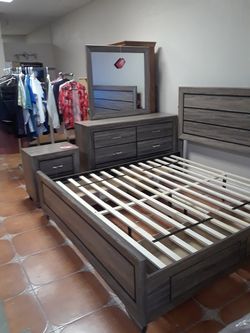 4 piece Eastern king bedroom set set includes Eastern King storage bed with drawers on both sides dresser mirror and nightstand