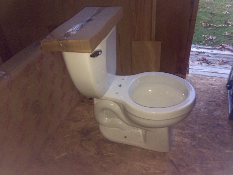 Brand new Niza Pro 2-piece 1.28 GPF Single Flush Round Toilet without Toilet Seat in White