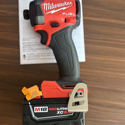 Milwaukee M18 FUEL 18V Lithium-Ion Brushless Cordless 1/4 in.  Impact Driver and 5.0ah battery