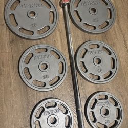 IVANKO’s  Olympic Weight Plates  (45s, 35s, 25s & 10s) In New Condition; Plus Titan 6ft Bar. Total: 270 lbs.