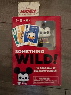 Something wild card game sealed and has Mickey figurine