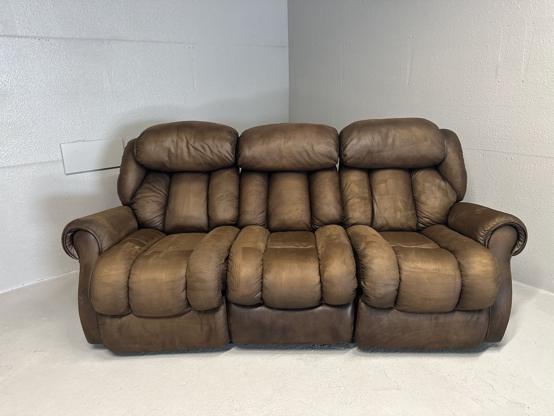 Brown reclining sofa, super comfy delivery available financing available 