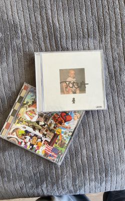 The Family CD And Signed TM CD