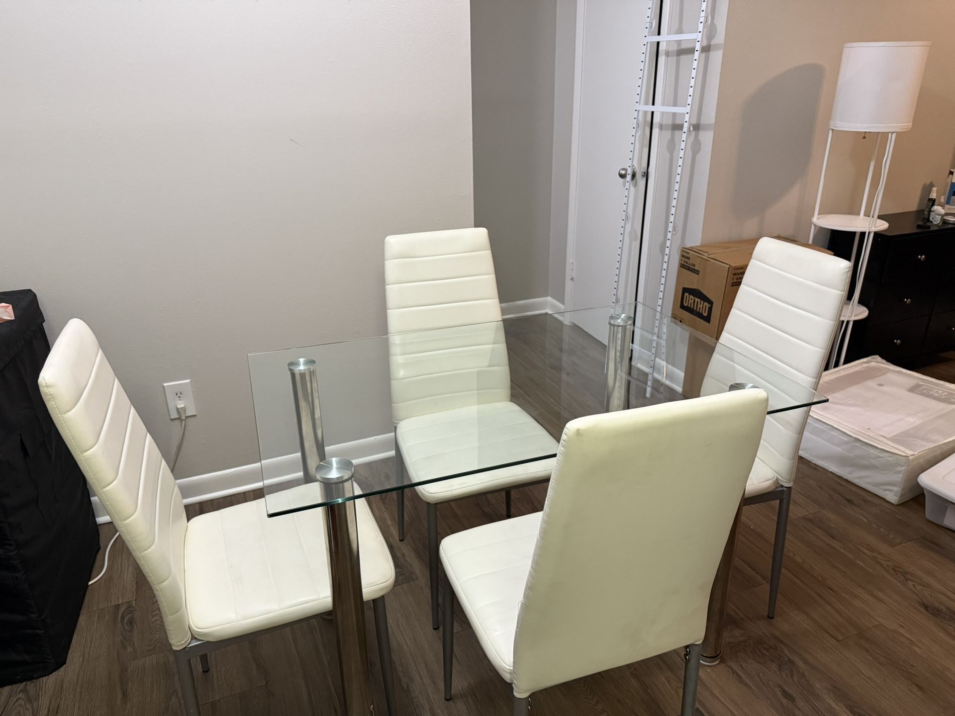Glass Dining Table With 4 White Chairs