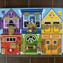 Melissa & Doug Latches Activity Board 