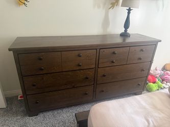 Brown dresser and night stand