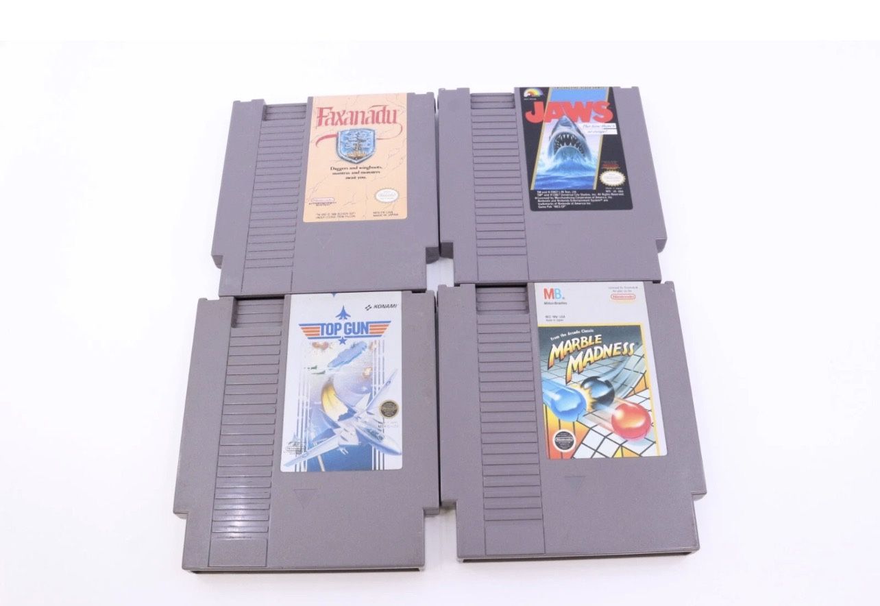 NES GAME LOT OF 4 - Faxanadu, Top Gun, Jaws, Marble Madness