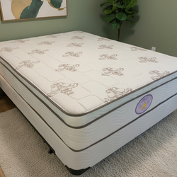 New queen mattress and box spring 2 pc bed frame is  not included