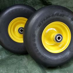 Pair of 15x6.00-6/4.50 Carlisle Reliance Smooth tire and wheel assembly Flat Free for zero turn mowers