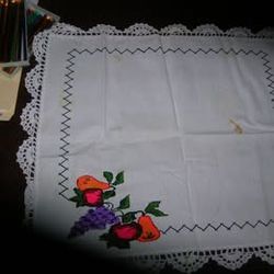 One - 21" x 17" Place mat ( Stain in upper right hand corner of picture)