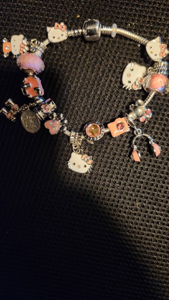 Hello Kitty silver charm bracelet with silver and pink Full Charms Brand new