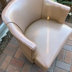 Vintage swiveling vinyl chair