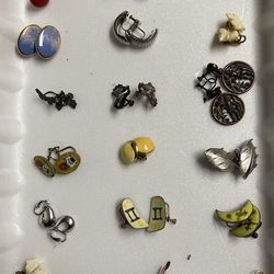18 pairs of costume earrings