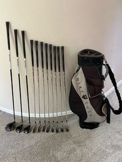 TaylorMade set of golf clubs plus Nike cart bag