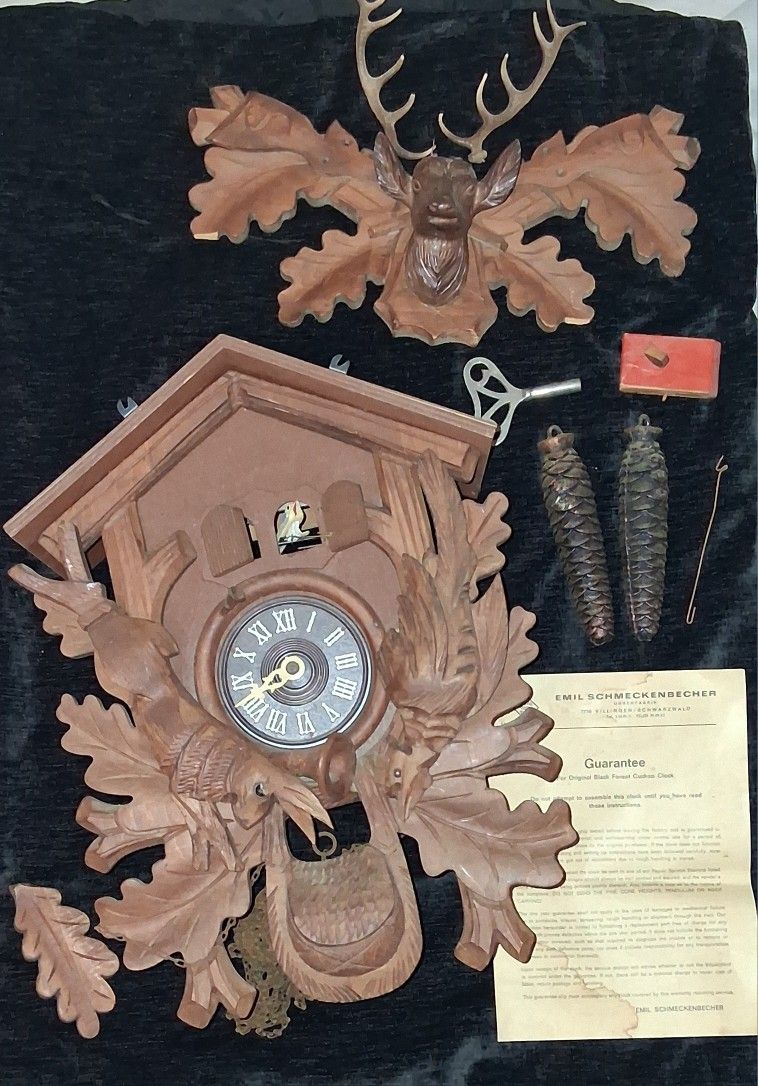 German Cucoo Clock With Pieces. Need Repair.