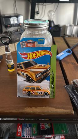 2015 Hot Wheels HW Workshop #202 '71 Datsun Bluebird 510 Wagon (Yellow #71)