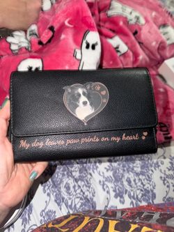 Black wallet with border collie