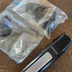 Vivitar  beard hair  trimmer( found these attachments  not sure if they fit)