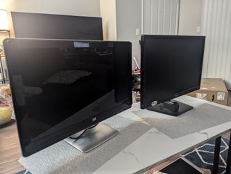 Two 23.5 Inch Monitors