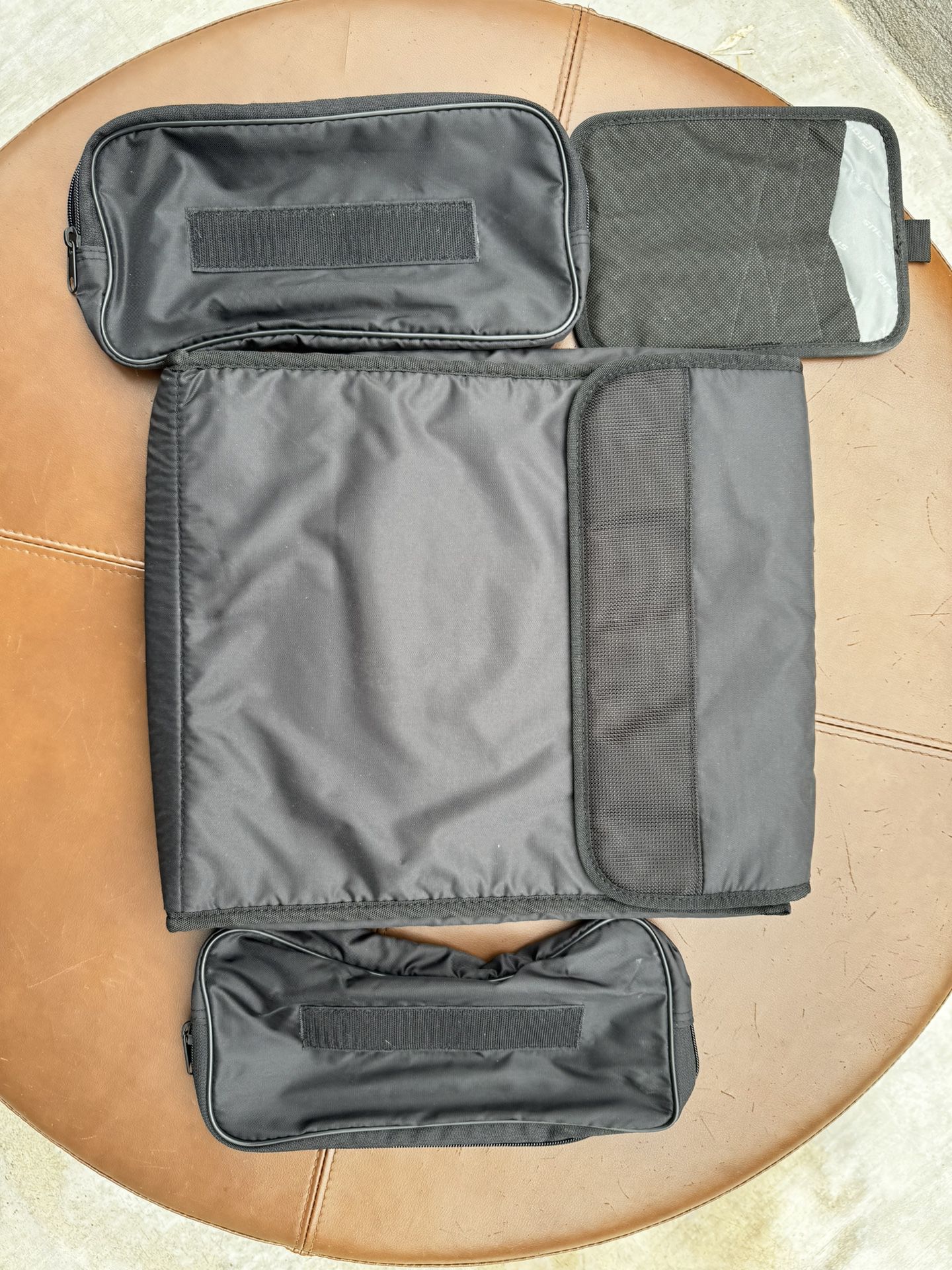 15-inch laptop bag + 3 small bags. 4 pieces in total