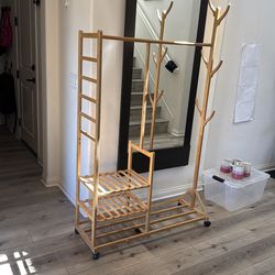 Portable closet rack on wheels