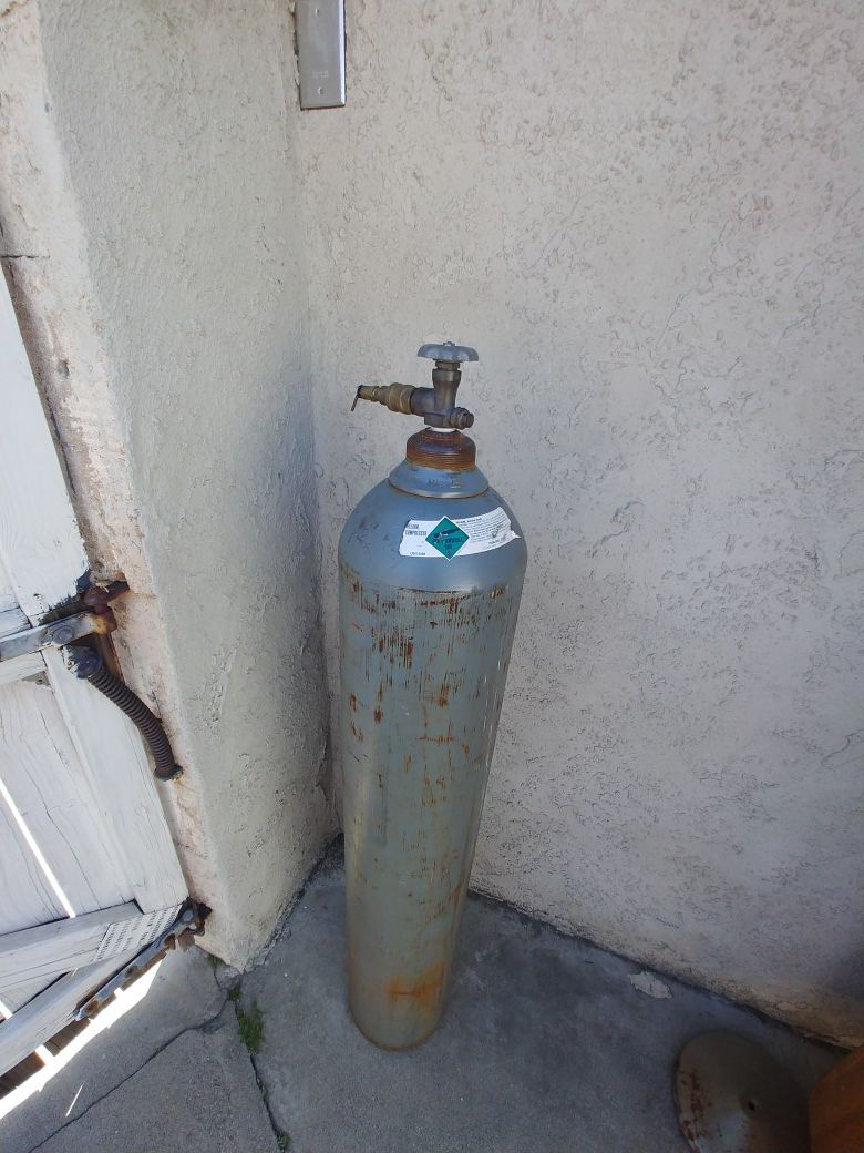 Helium tank 5ft.tall empty
