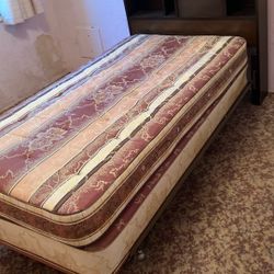 Single bed with built-in bookshelf, mattress, box, springs, and steel frame