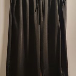 Pair of black wide-leg crop pants with an elasticated drawstring waist and side pockets size 3XL