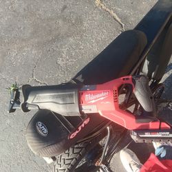 Milwaukee Sawzall And Milwaukee Battery 