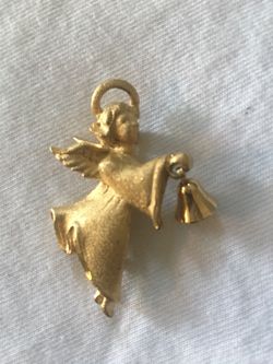 Angel with bell brooch