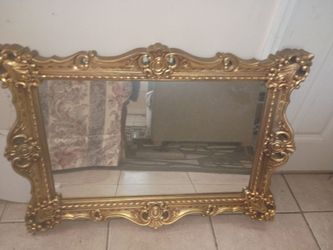 Gold ornate mirror