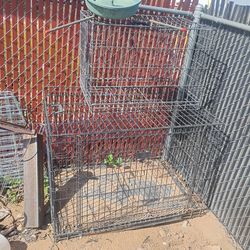 Black cages 1 big 1 small and plant holders