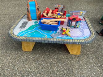 Train table with wood train tracks