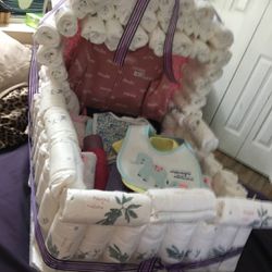 Rolled up diapers for diaper cake or bassinet