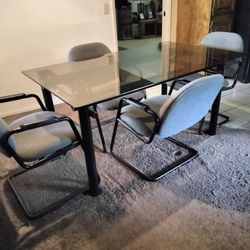 Glass Table &  4  Chairs $70