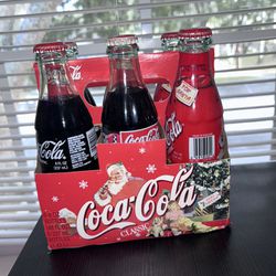 Rare Vintage Coca Cola Classic Christmas Edition Bottles - A Festive Blast from the Past